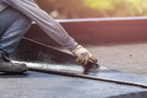 Professional Basement Waterproofing technician working in Parkville, PA